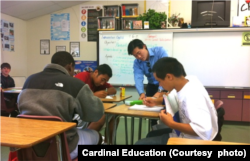 Allen Koh, the founder of Cardinal Education in California, works with students to help get them ready for applying to college. (Courtesy photo)