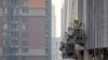 China Cuts Key Rates as Weak Batch of July Data Darkens Economic Outlook