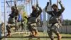FILE - Service members from Belarus and China do joint military exercises at an undisclosed location in Belarus, in this Belarusian Defense Ministry handout picture released July 9, 2024. China is beefing up military cooperation with Belarus and Russia.