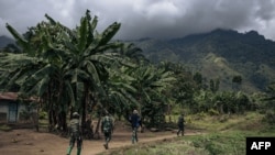Wanajeshi wa Congo wakifanya doria katika kijiji cha Mwenda kilichoko Kaskazini Mashariki mwa DRC. Picha ya maktaba na ALEXIS HUGUET / AFP.