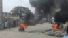 Protesto contra mau estrado das estradas no bairro Uíge, em Luanda, Angola, 15 Fevereiro 2023