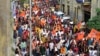 Devotees take part in a religious procession to celebrate the annual Hindu festival of Ram Navami in Ahmedabad on March 30, 2023.
