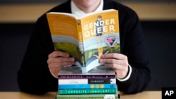 The American Library Association reported Wednesday, Sept. 20, 2023, that challenges to books in schools and public libraries will likely reach record highs in 2023, topping what had been a record pace in 2022. (AP Photo/Rick Bowmer, File)