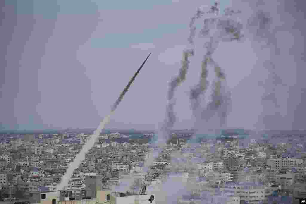 Rockets are launched by Palestinian militants from the Gaza Strip towards Israel, Oct. 7, 2023. 