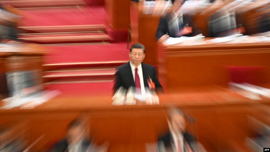 中國領導人習近平在北京人大會堂出席全國人大會議開幕儀式。 （2024年3月4日）