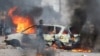 Carro incendiado em Maputo, Moçambique
