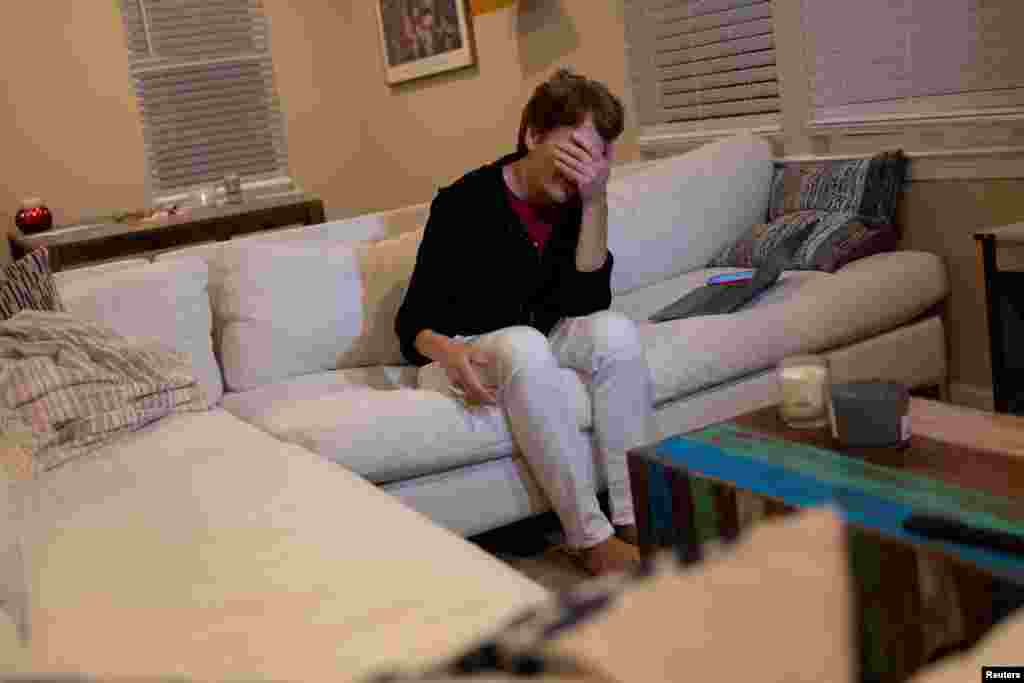 Scientist Carolyn Bertozzi reacts at her home after winning one of three Nobel Prize in Chemistry, in Palo Alto, California, Oct. 5, 2022.