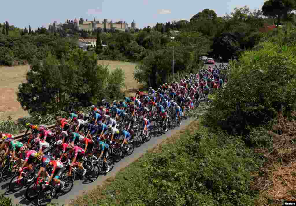 Competitors are seen during the 16th stage of the Tour de France cycling race, which covers 178.5 kilometers, with the start in Carcassonne and the finish in Foix, France. 