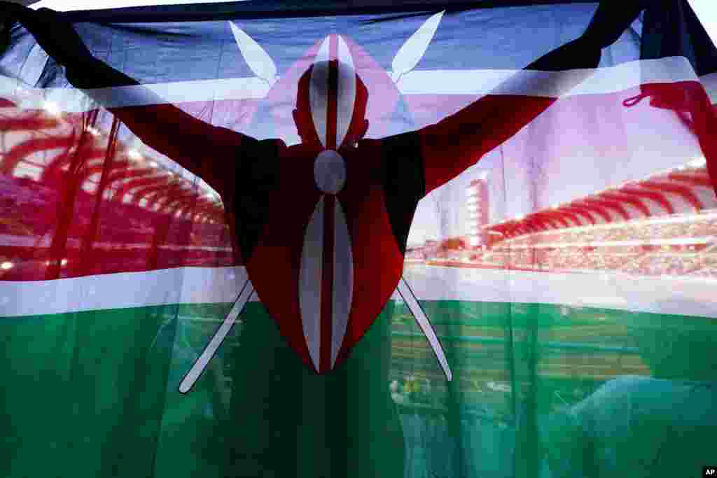 A fan of Kenya holds up a flag during the final in the women's 5000-meter run the World Athletics Championships, July 23, 2022, in Eugene, Oregon, U.S.
