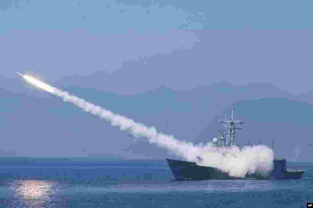 A Cheng Kung class frigate fires an anti-air missile as part of a navy demonstration in Taiwan's annual Han Kuang exercises off the island's eastern coast near the city of Yilan.