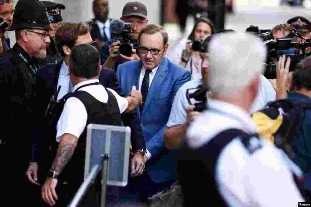 Actor Kevin Spacey arrives at the Central Criminal Court before attending a hearing over charges related to allegations of sex offences, in London.
