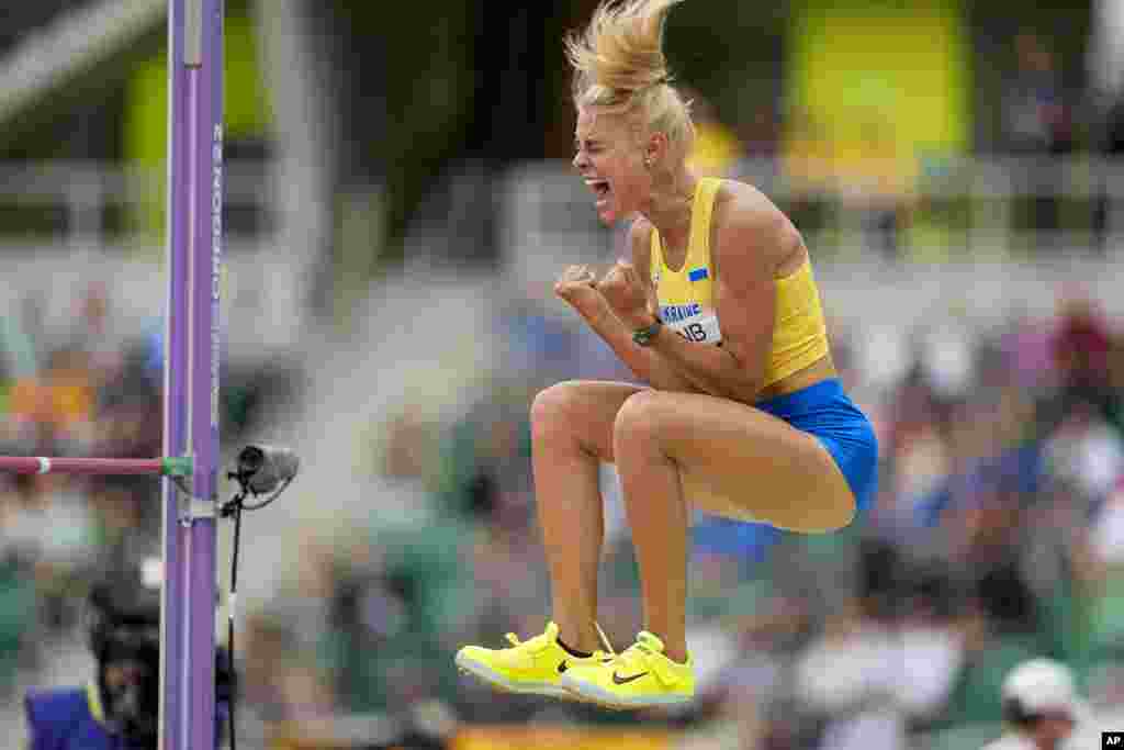 Yuliya Levchenko of Ukraine celebrates during qualifying for the women's high jump at the World Athletics Championships, July 16, 2022, in Eugene, Oregon.