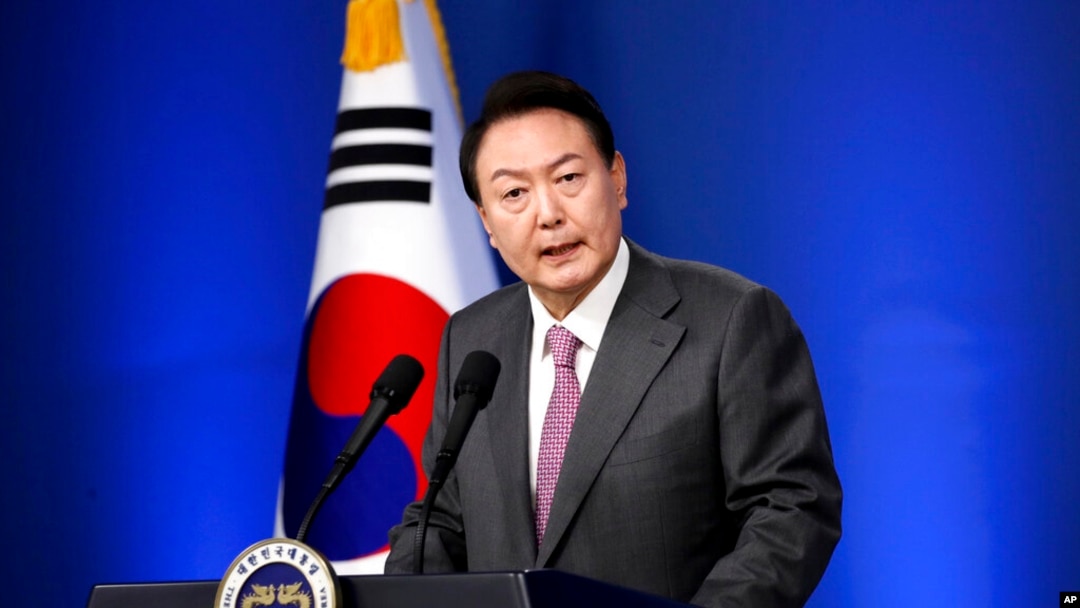 South Korean President Yoon Suk Yeol delivers a speech during a news conference to mark his first 100 days in office at the presidential office in Seoul, South Korea, Aug. 17, 2022. 