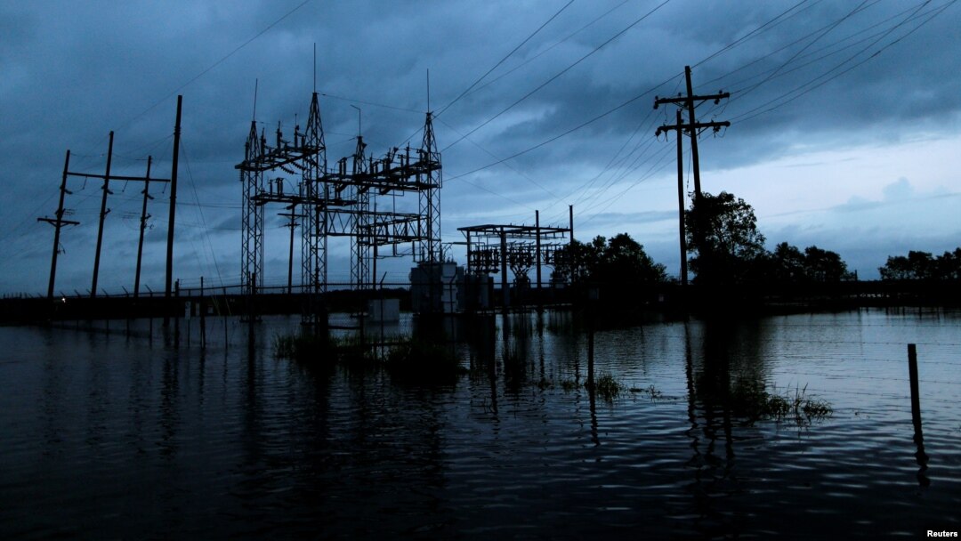 Floodwaters from Tropical Storm Harvey surround a power sub-station in Iowa, Calcasieu Parish, Louisiana, Aug. 29, 2017.