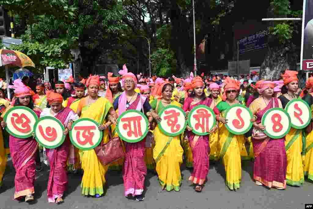 Hindu devotees take part in a procession during celebrations for the 'Janmashtami' festival, which marks the birth of Hindu god lord Krishna, in Dhaka.