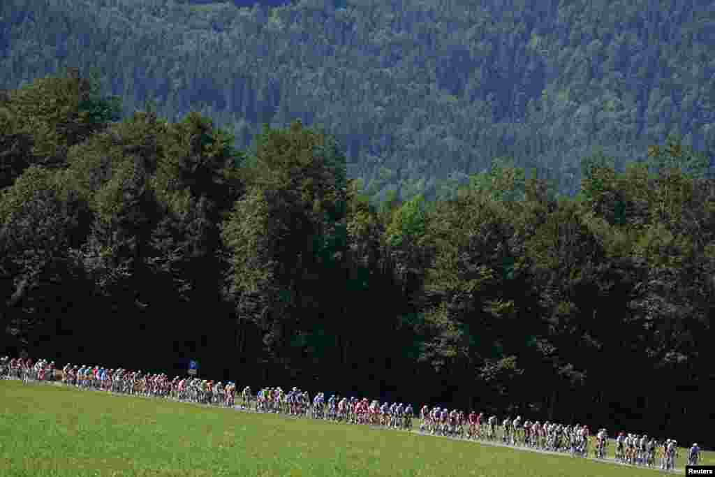 Riders compete during the men's road race cycling event of the European Championships in Staffelsee, Germany.