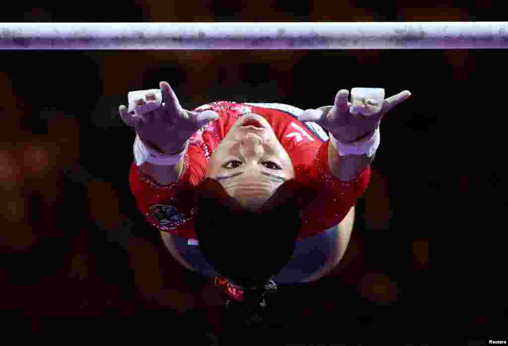 Germany's Kim Bui competes during the women's uneven bars final artistic gymnastics event of the European Championships in Munich, Germany.