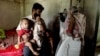 With his family, Mohammad Selim, a Rohingya Muslim refugee, is hiding in a village in eastern India, May 2019, after fleeing a police crackdown in a Rohingya refugee colony in north India. Recently the Rohingya man was arrested and sent to jail by Indian 