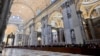Faithful queue up to pay respect at the body of Pope Emeritus Benedict XVI at St. Peter's Basilica in the Vatican, Jan. 2, 2023. 