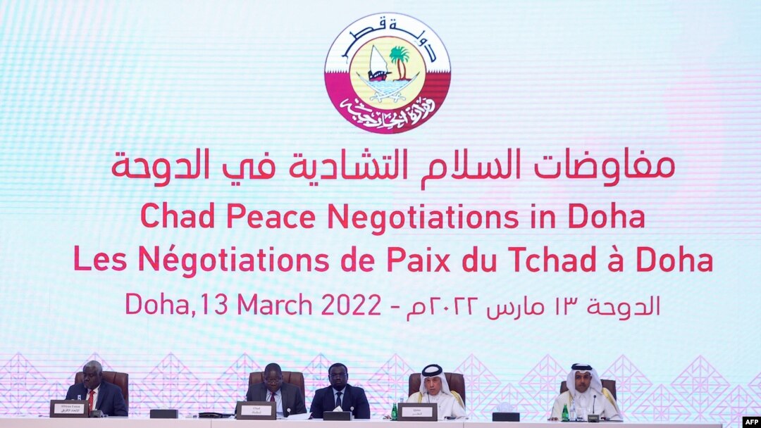 FILE - Participants take their seats on the podium as the Chad Peace Negotiations start in Qatar's capital Doha, on March 13, 2022.