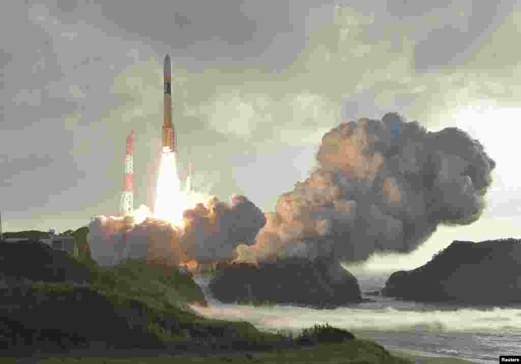 An H-2A rocket carrying Japan's fourth and final quasi-zenith satellite, the Michibiki No. 4, lifts off from the Tanegashima Space Center in Kagoshima Prefecture, southwestern Japan in this photo taken by Kyodo.