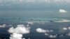 Land reclamation of Mischief Reef in the Spratly Islands by China in the South China Sea on May 11, 2015. (Ritchie B. Tongo/AP)