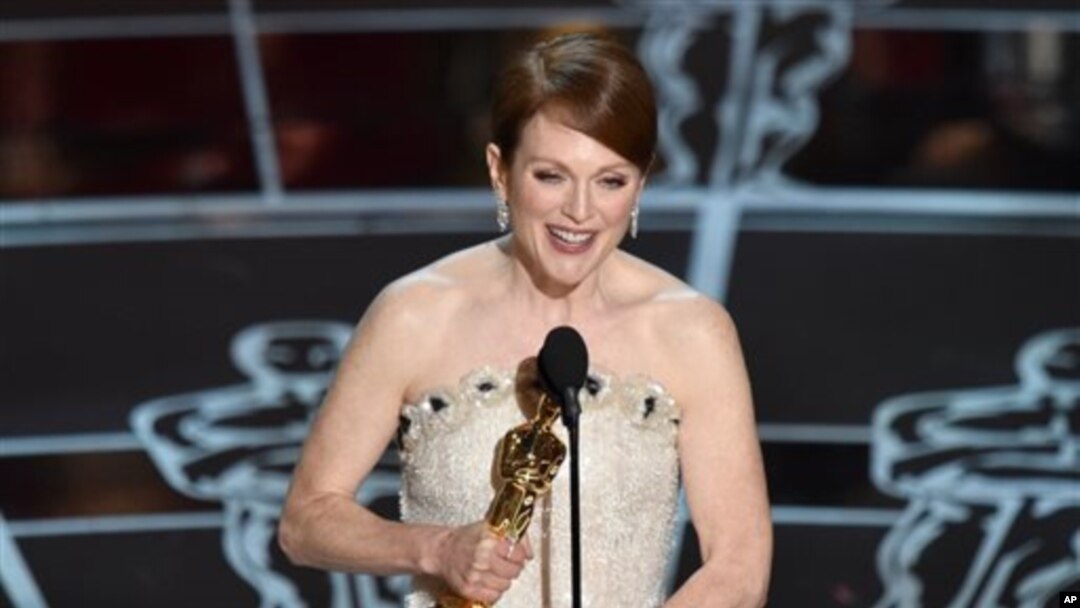 Julianne Moore accepts the award for best actress in a leading role for “Still Alice at the Oscars on Sunday, Feb. 22, 2015, at the Dolby Theatre in Los Angeles. (Photo by John Shearer/Invision/AP)