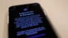 A screen displays a notice when installing the update, iOS 13.2 on an iPhone, Oct. 29, 2019, in New York.