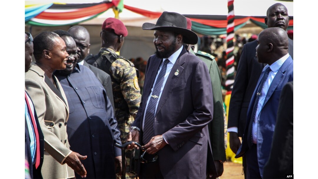South Sudan's President Salva Kiir, center, attends the departure ceremony of the South Sudan People's Defence Forces, at SSPDF headquarters in Juba, Dec. 28, 2022.