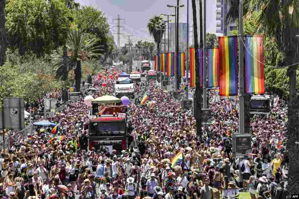 Participants march during the annual Pride Parade in Israel's Mediterranean coastal city of Tel Aviv.