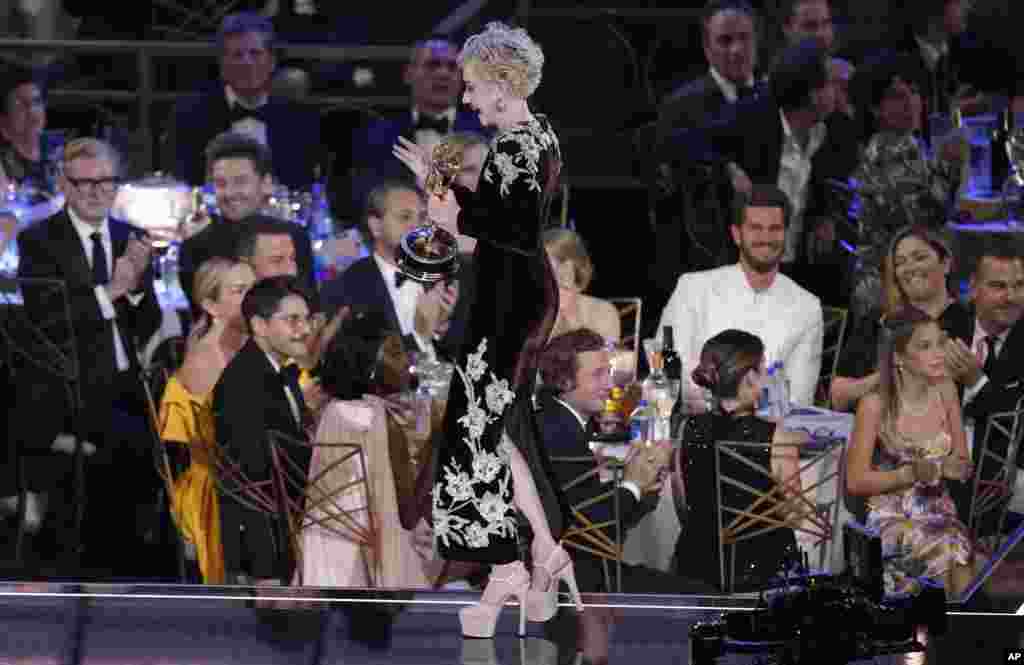 Julia Garner accepts the Emmy for outstanding supporting actress in a drama series for "Ozark" at the 74th Primetime Emmy Awards, Sept. 12, 2022, at the Microsoft Theater in Los Angeles.
