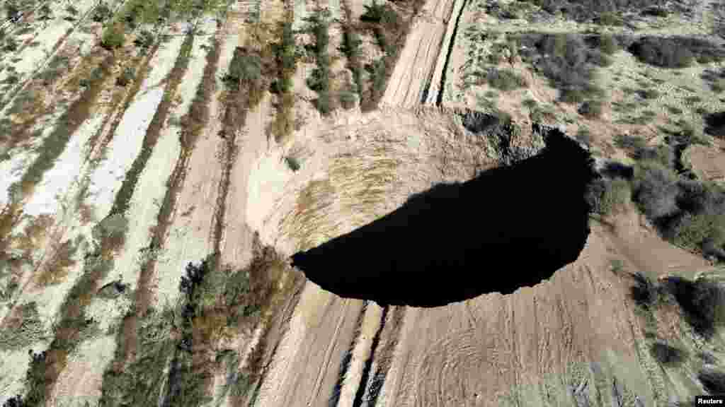 A sinkhole is exposed at a mining zone close to Tierra Amarilla town, in Copiapo, Chile, Aug. 1, 2022.