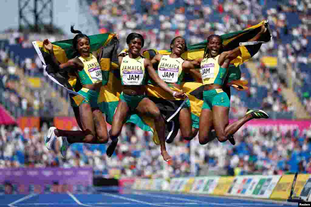 Jamaica's Elaine Thompson-Herah, Remona Burchell, Kemba Nelson and Natalliah Whyte celebrate after winning bronze in the women's 4 x 100m relay final event at the Alexander Stadium, Birmingham, England, during the Commonwealth Games.