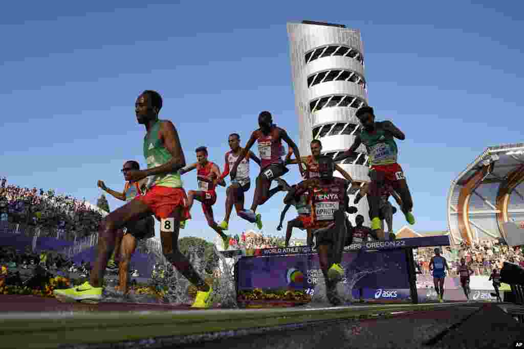 Runners compete during the men's 3000-meter steeplechase final at the World Athletics Championships, in Eugene, Oregon, U.S.