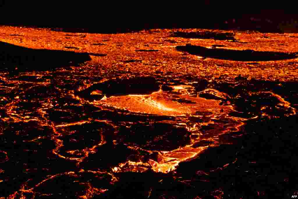 Lava flows from the volcano that has been erupting since Aug 3, 2022, in Fagradalsfjall, Iceland, around 40 kilometers from the capital Reykjavik.