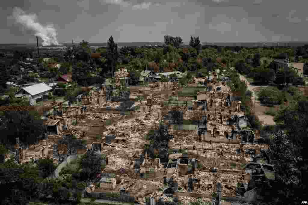 An aerial view shows destroyed houses after strike in the town of Pryvillya at the eastern Ukrainian region of Donbas amid Russian invasion of Ukraine.