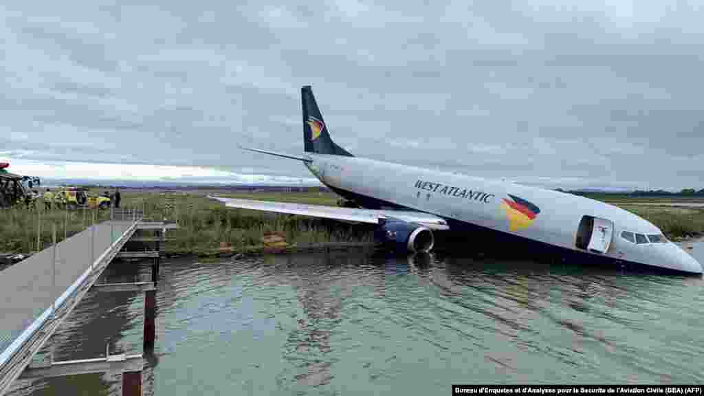 This handout picture on Sept. 24, 2022 shows an Aeropostale Boeing 737 aircraft after it overran the runway during its landing phase at night at Montpellier airport in Montpellier in France.