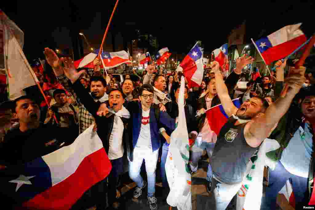 Supporters of "I Reject" option react to early results of the referendum on a new Chilean constitution in Valparaiso, Chile, Sept. 4, 2022.
