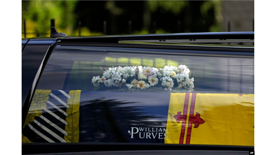 The coffin containing the body of Britain's Queen Elizabeth II leaves Balmoral Castle in Scotland, Sept. 11, 2022.