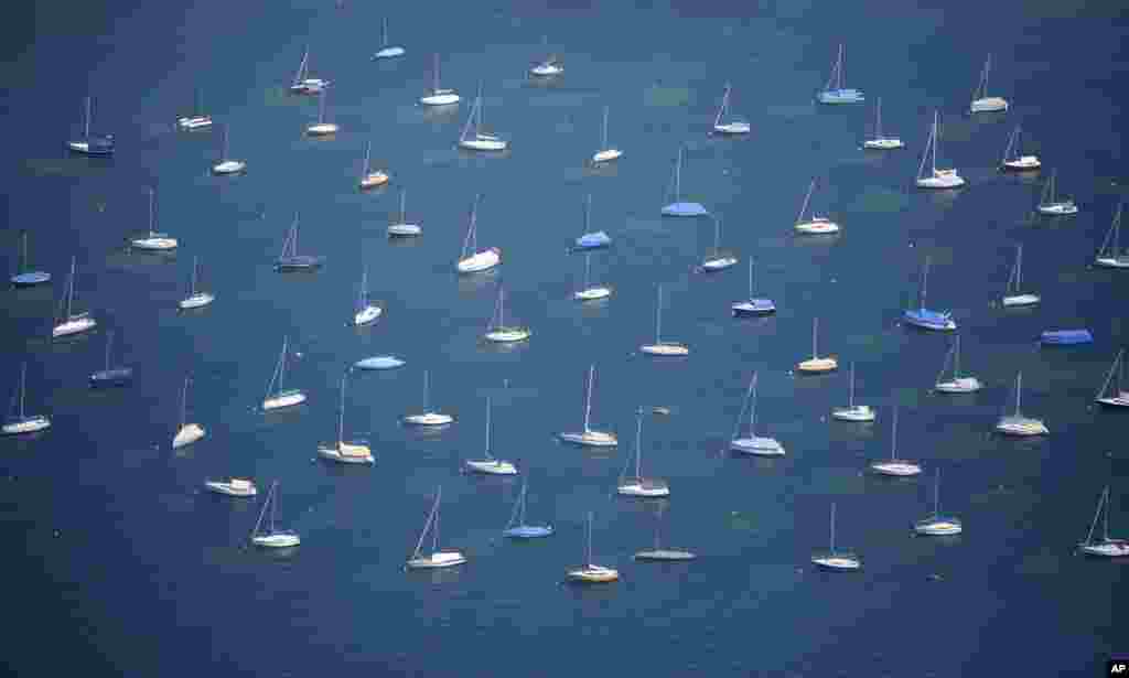 Sailing boats anchor on lake Bodensee in Konstanz, Germany.