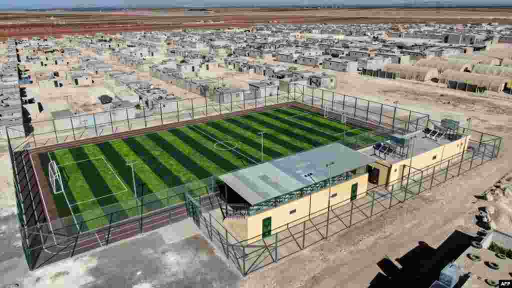 An aerial view of a football pitch is seen in the Zawghara camp for displaced Syrians, which houses around 3,000 families, in the vicinity of Jarabulus close to the border with Turkey in the rebel-held north of Syria's Aleppo province.