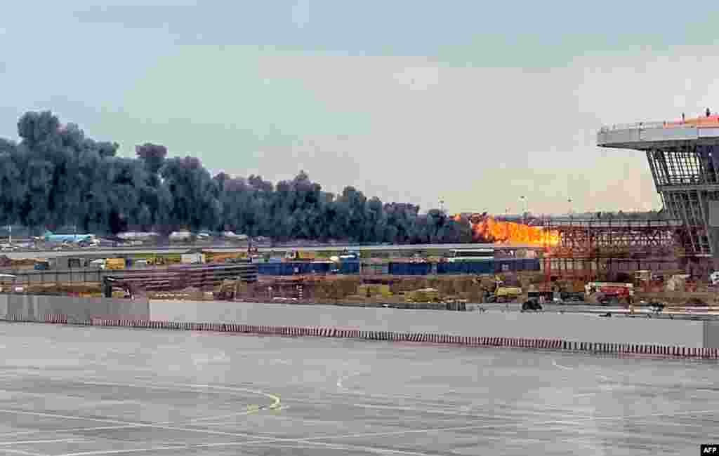 A Russian-made Superjet-100 is on fire at Sheremetyevo airport outside Moscow. At least 40 people died when an Aeroflot airliner burst into flames while making an emergency landing at the airport, officials said.
