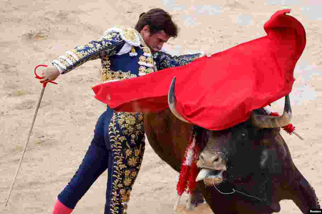 Spanish bullfighter El Juli performs during a bullfight at the San Fermin festival in Pamplona, Spain.