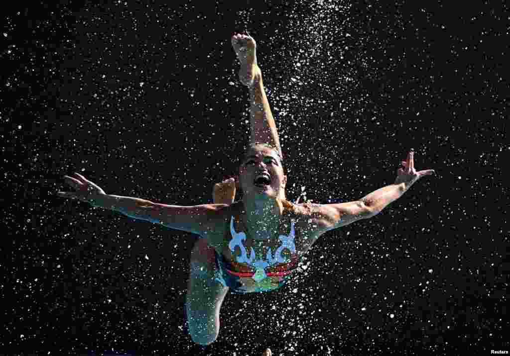 A member of team Japan performs during the women's team free final at the FINA World Championships in Budapest, Hungary.