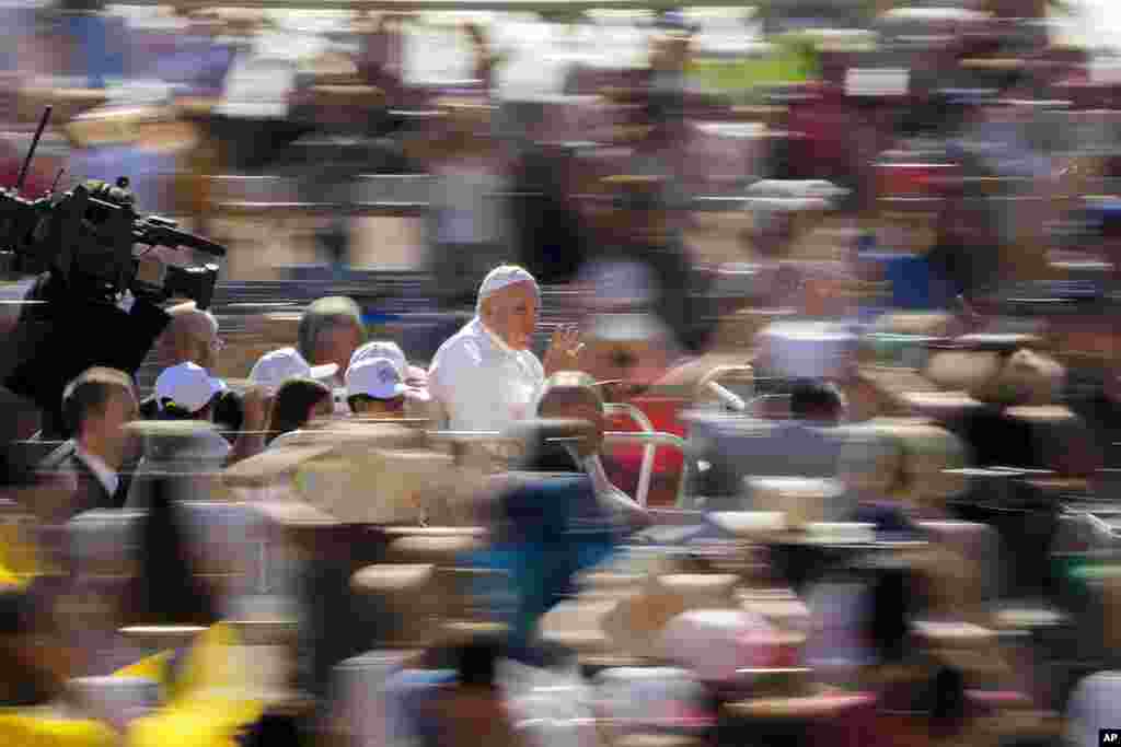 Pope Francis arrives to his weekly general audience in St. Peter's Square at The Vatican.
