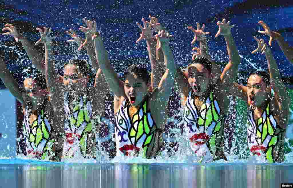 Team Japan compete during the women's team technical preliminary at the 19th FINA World Championships in Budapest, Hungary.