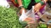 Vegetable sellers in India have long used as thin as 8-micron single-use plastic carry bags. (Shaikh Azizur Rahman/VOA)