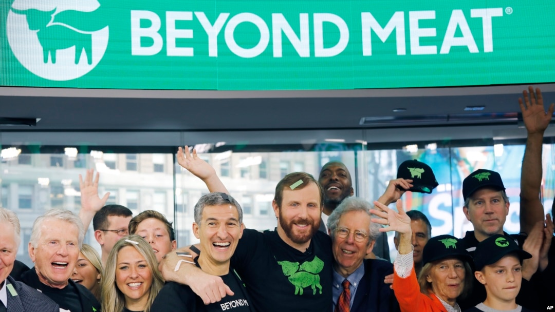 Ethan Brown, center, CEO of Beyond Meat, attends the Opening Bell ceremony with guests to celebrate the company's IPO at Nasdaq, Thursday, May 2, 2019 in New York. 