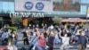 Gökçe Sentürk, center, is one of the organizers of this small and heavily policed Istanbul protest, on June 5, 2020. (Heather Murdock/VOA)