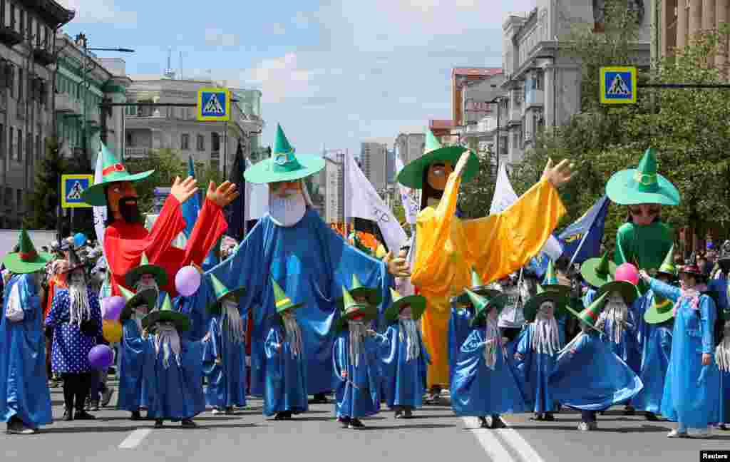 Participants attend an annual carnival to celebrate the International Children's Day, in Krasnoyarsk, Russia, June 1, 2019.